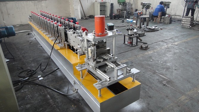 Automatic 4Kw 12 Roller Stations 1.2 Inch Steel Roll Forming Machine with Two Output Table